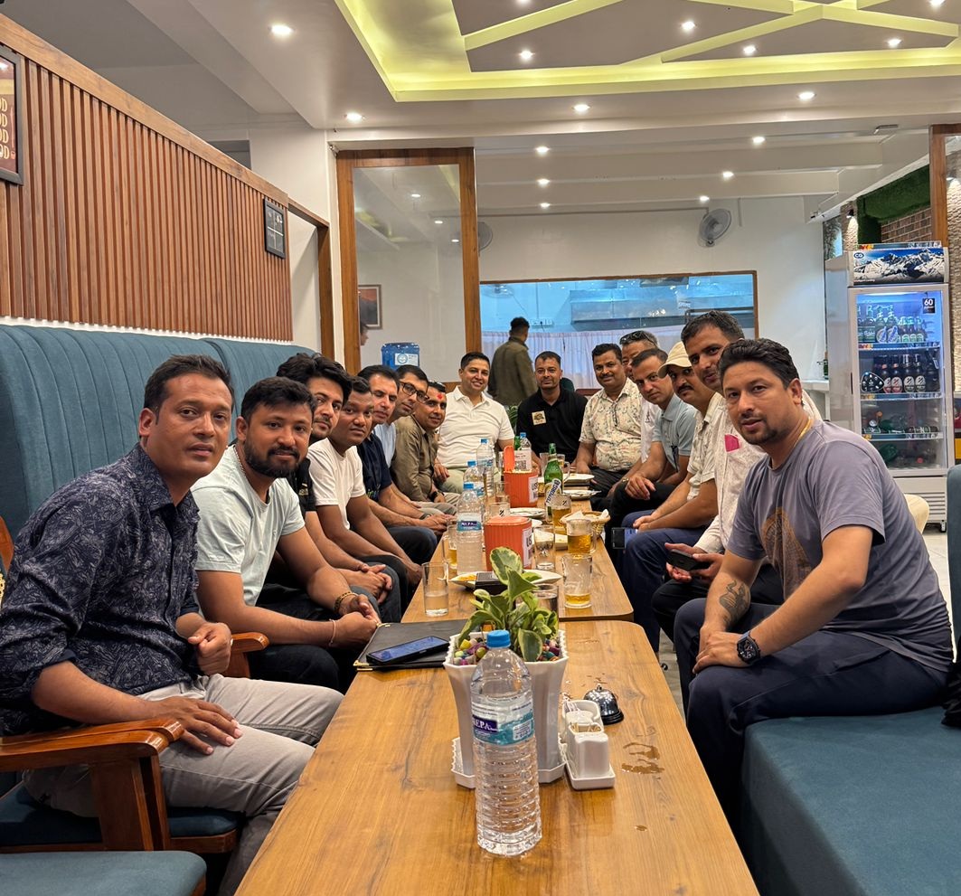 Happy customers gathering at Yatri Cafe - Best restaurant in Pokhara for groups and families